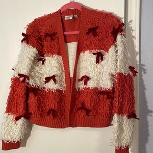 Christmas sweater, size large, red and white with red velvet bows